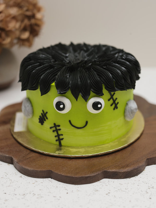 Frankenstein Halloween cake with black buttercream hair