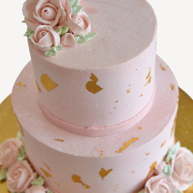 Edible Wafer Paper And Gold Leaf Cake In Pink And Gold Four Tiers Of Oink  And Gold With The Top Tier Covered In Pink Fondant The Second In 